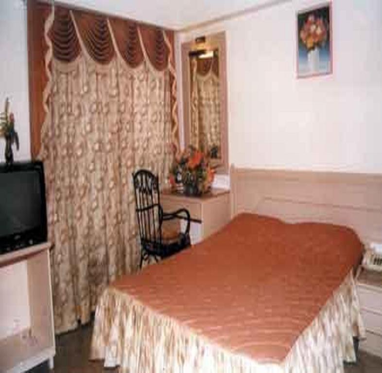 Hotel Karan Palace Мумбаї Номер фото