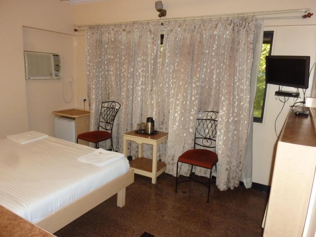 Hotel Karan Palace Мумбаї Номер фото